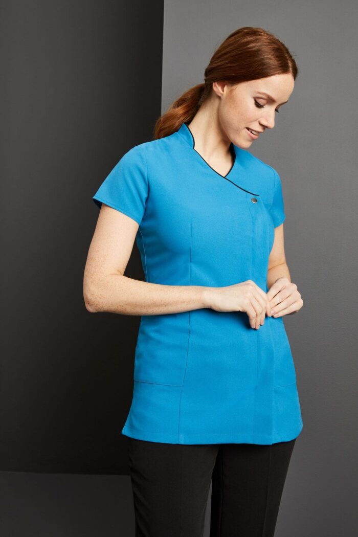 One button tunic with pocket and colored trim